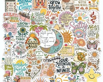 May include: A collection of assorted vinyl stickers featuring colourful illustrations of flowers, butterflies, suns, moons, and snails. Each sticker includes motivational text such as Good Things Are Coming, Let's Grow Together, and All Good Things Are Wild and Free.