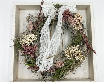 Romantic moss wreath with lavender and dried rosemary