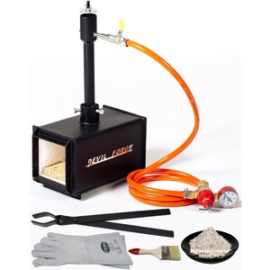 May include: A black metal forge with an orange hose and a pressure gauge. The forge has a label that reads "DEVIL FORCE". The set includes a pair of tongs, a pair of gloves, a paintbrush, and a small bowl of refractory mortar.