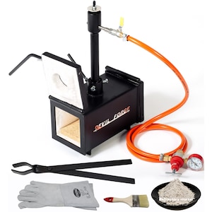 May include: Black metal forge with an open door, a black metal tong, a pair of grey leather gloves, a red paintbrush, a small plate with grey refractory mortar, and a black and orange gas hose with a regulator.