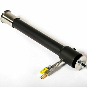 May include: A black metal burner with a stainless steel collar and a valve with a yellow handle. The burner is designed for use with a propane or natural gas line.