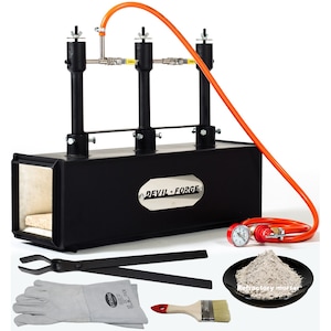 May include: A black metal forge with a white refractory lining. It includes a propane torch, a pressure gauge, a pair of tongs, a pair of welding gloves, a paintbrush, and a bag of refractory mortar.