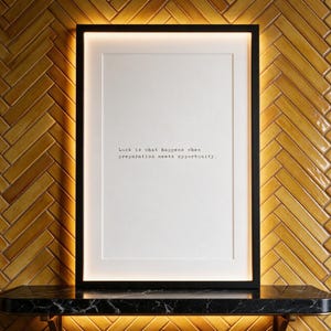 Entrepreneurial mindset typography print, glazed herringbone wall decor above a dark marble shelf, a driven gift for an ambitious business owner.