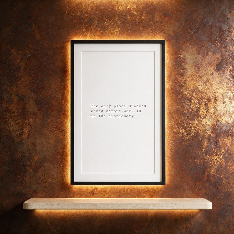 Black and white discipline typography print, foundry apartment wall decor above a pale stone console, a motivating gift for driven professionals.