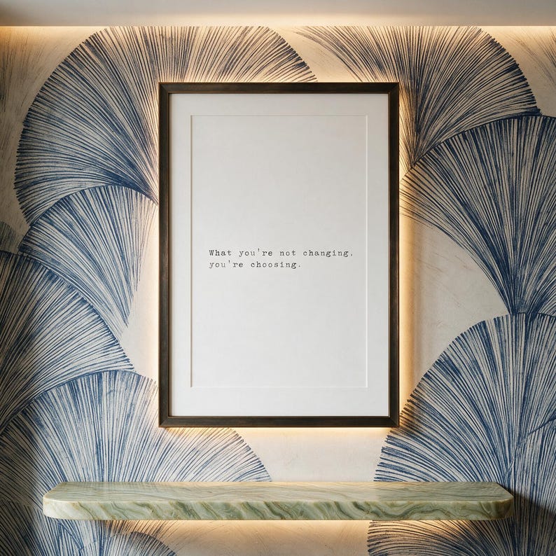Framed discipline typography print in a dark bronze frame on a navy hand-drawn fan mural wall, study decor above a pale green banded marble shelf, a considered gift for a graduate or a founder.