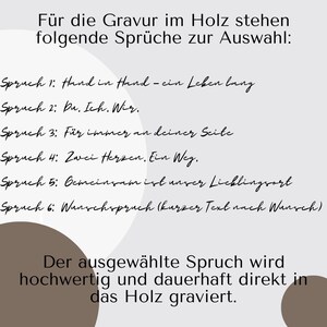 May include: Text on a light background, offering phrases for wood engraving. Phrases include "Hand in Hand - a lifetime", "You, Me, Us", and "Forever by your side." The selected phrase is engraved directly into the wood.