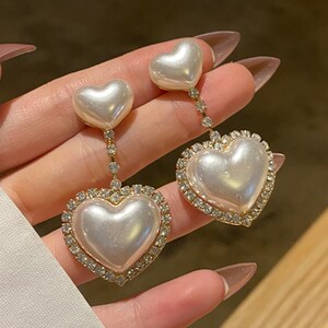 Pearl heart shop shaped earrings