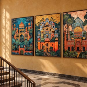 May include: Three rectangular framed wall art prints featuring detailed illustrations of ornate palaces with domes, arches, and towers, set amidst lush green trees. The artwork displays vibrant colour palettes of orange, blue, and gold tones.
