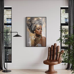 a large framed painting of a woman with a headdress, hanging on a white wall in a room with a wooden chair and a plant.