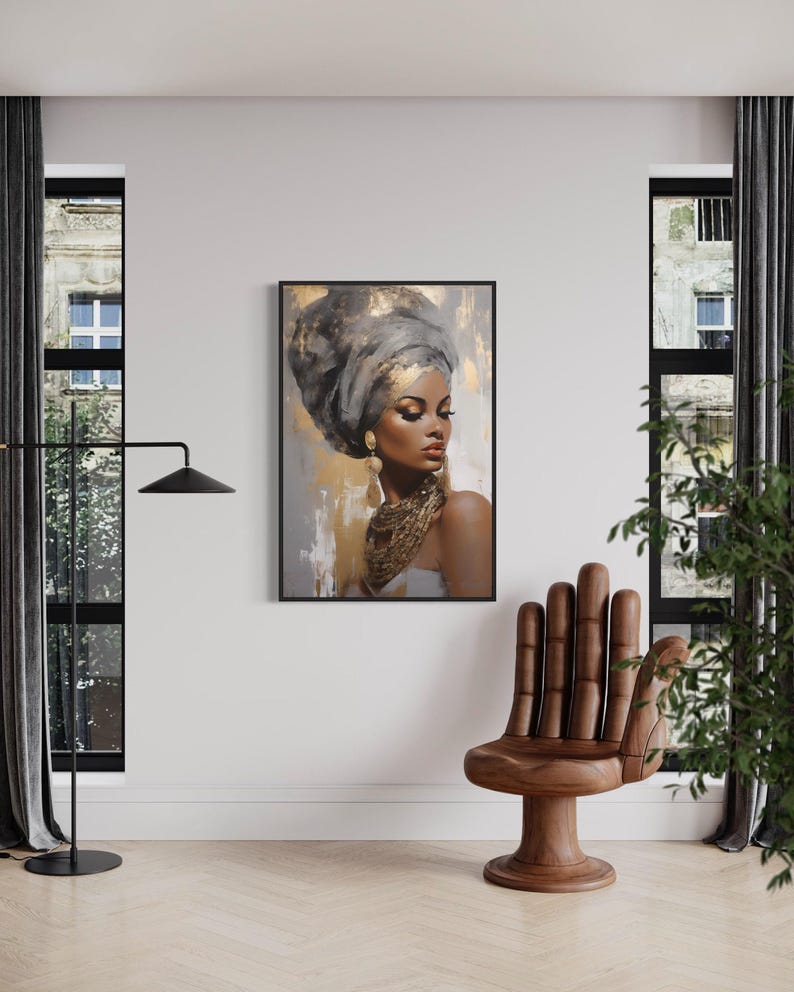 a large framed painting of a woman with a headdress, hanging on a white wall in a room with a wooden chair and a plant.