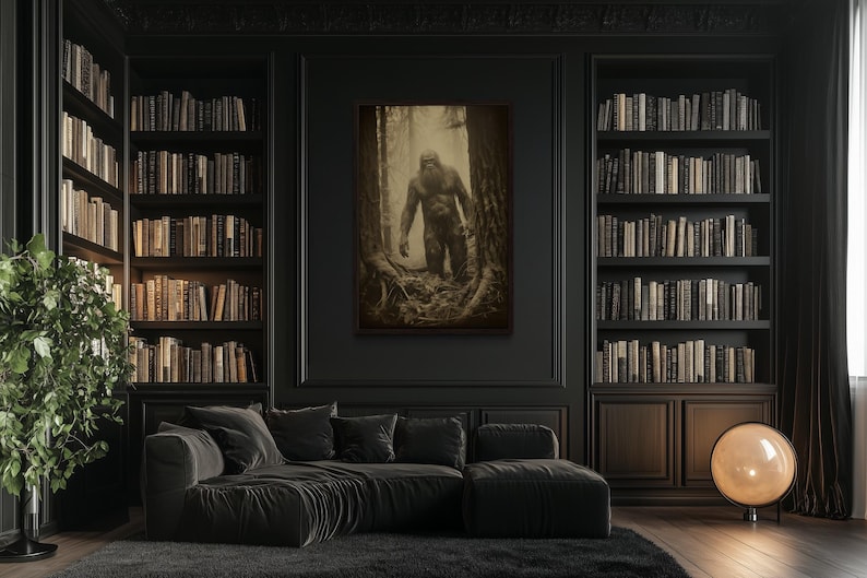 a dark, cozy living room with a large bookshelf filled with books, a comfortable couch, and a framed artwork of a person in a forest setting.