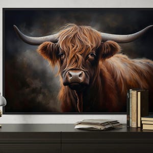 a large painting of a horned cow with long hair, displayed on a wall above a wooden dresser.