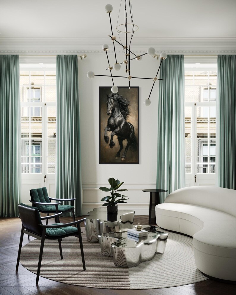 a modern living room with a large black horse painting on the wall, a white sofa, a round coffee table, and a large chandelier overhead.