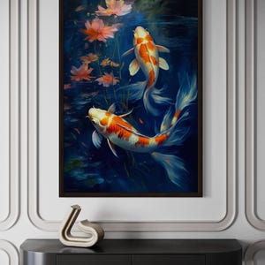 a framed painting of two koi fish swimming in a pond, surrounded by pink flowers.