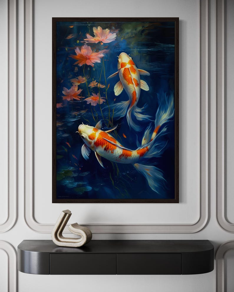 a framed painting of two koi fish swimming in a pond, surrounded by pink flowers.
