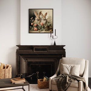 a cozy living room with a fireplace, a beige armchair, and a wooden coffee table. A framed painting of two rabbits is hanging on the wall above the fireplace.
