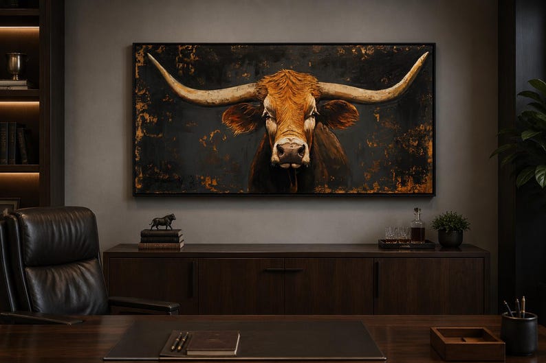 May include: A rectangular wall art piece featuring a detailed portrait of a brown longhorn bull with large, sweeping horns. The bull is set against a dark, textured background with distressed gold and bronze accents, framed in a thin black border.