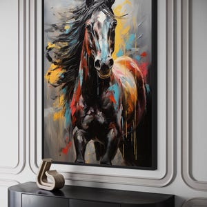 a large, colorful painting of a horse with flowing mane and tail, displayed on a wall above a black shelf.