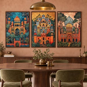 May include: A set of three framed vertical wall art prints depicting intricate architectural structures with domes and arches in vibrant shades of orange, blue, and gold, surrounded by stylised trees and foliage, displayed above a wooden sideboard.