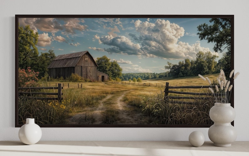 a serene rural landscape with a large wooden barn, a dirt path leading to the barn, and a fence in the foreground. The sky is filled with clouds, and the scene is surrounded by trees and grass.