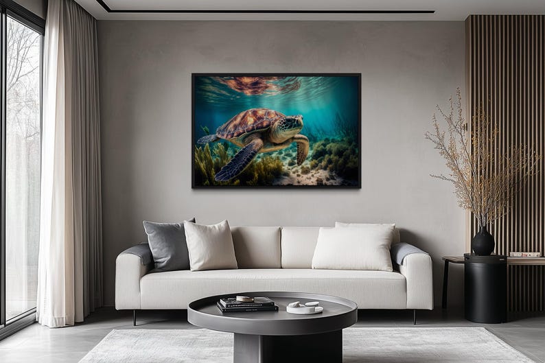 a large, framed photograph of a sea turtle swimming in the ocean, hanging on the wall of a modern living room.