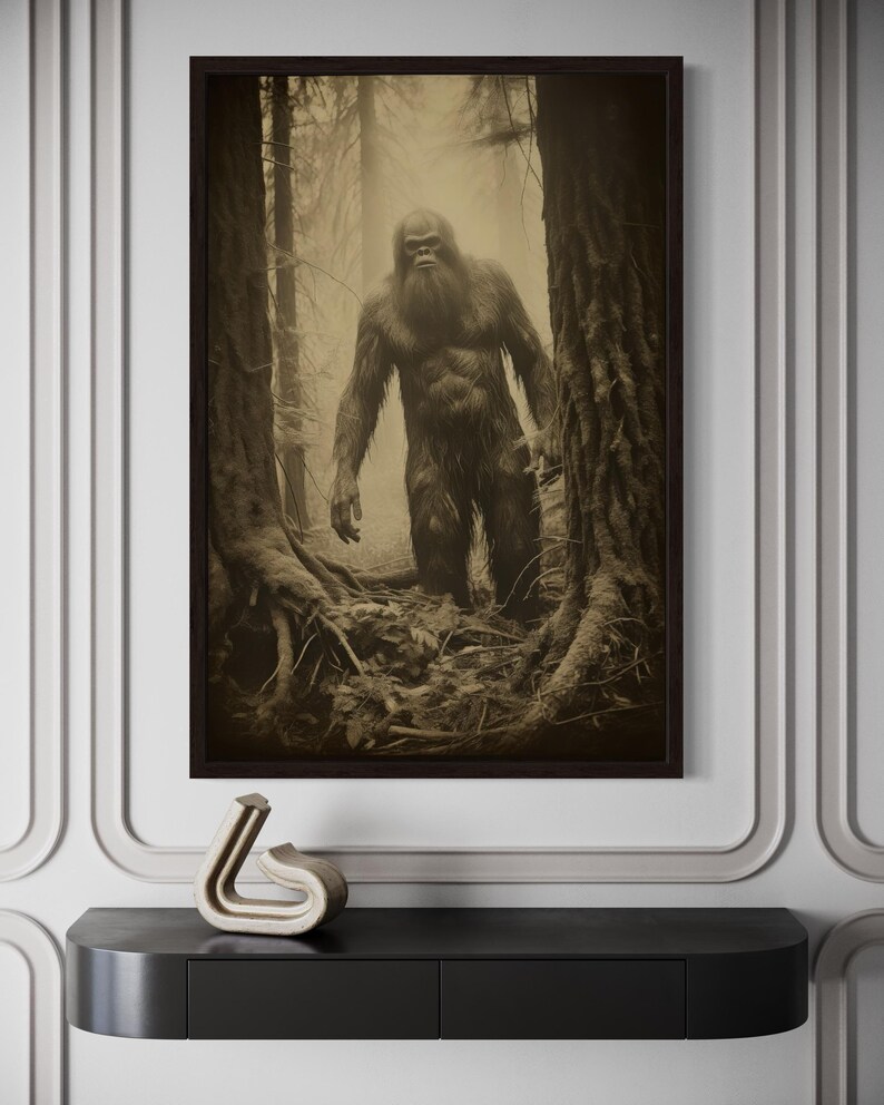 a large black and white photograph of a Sasquatch-like creature standing in a forest setting.