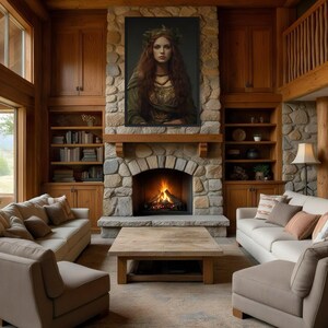 a cozy living room with a stone fireplace, wooden furniture, and large windows overlooking a scenic outdoor view.