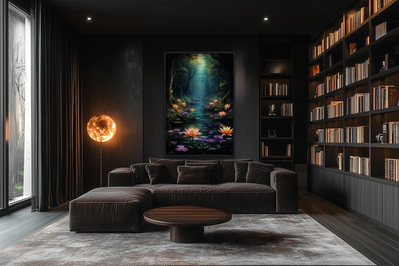 a modern living room with a large bookshelf filled with books, a comfortable sofa, and a round wooden coffee table. The room has a dark color scheme and features a large painting of a forest scene with a pond and flowers on the wall.