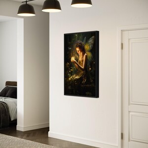 a fairy with a glowing light in her hand, set against a white wall with a framed painting hanging above it.