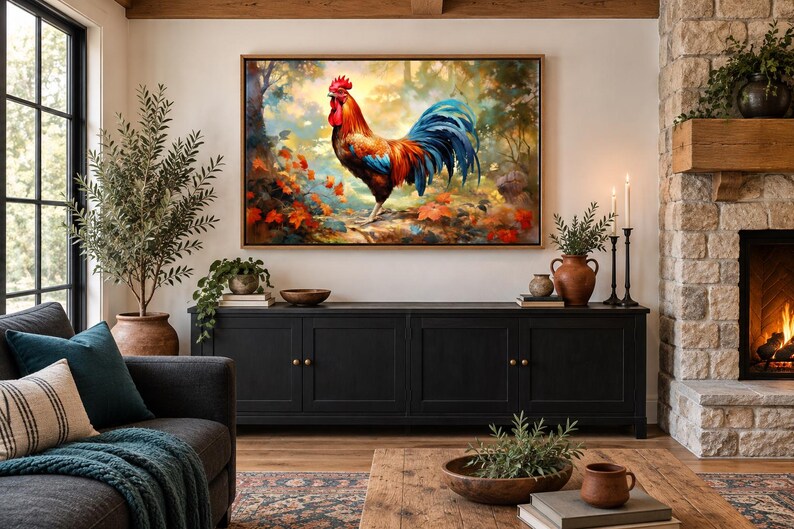 May include: A rectangular wall art print featuring a vibrant rooster with red, orange, and blue plumage standing in a forest setting with autumn leaves. The artwork is enclosed in a thin wooden frame and displayed above a black media console cabinet.