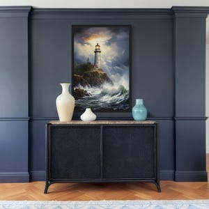 a living room with a large painting of a lighthouse on the wall, a black console table with decorative items, and a white sofa.
