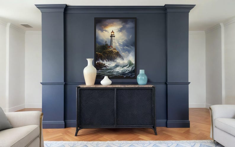 a living room with a large painting of a lighthouse on the wall, a black console table with decorative items, and a white sofa.