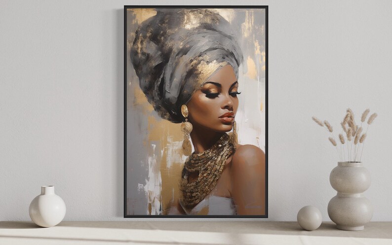 a large framed painting of a woman with a headdress, displayed on a wall.