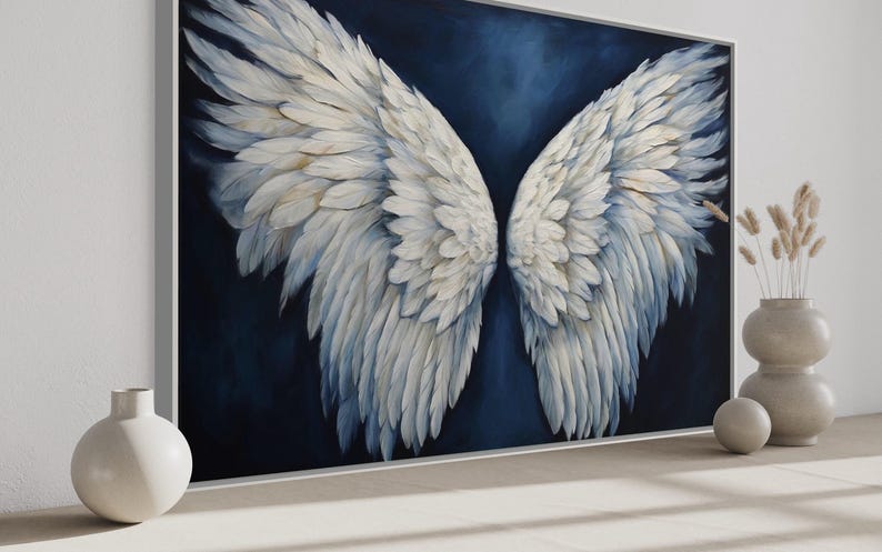 a large painting of white feathers on a dark background, with two white vases and a potted plant placed in front of it.