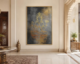 May include: A rectangular wall art piece featuring a gold line drawing of a deity in a seated lotus position, holding a lotus flower. The artwork is set against a dark, textured background with smoky gray and gold tones, enclosed in a thin gold frame.
