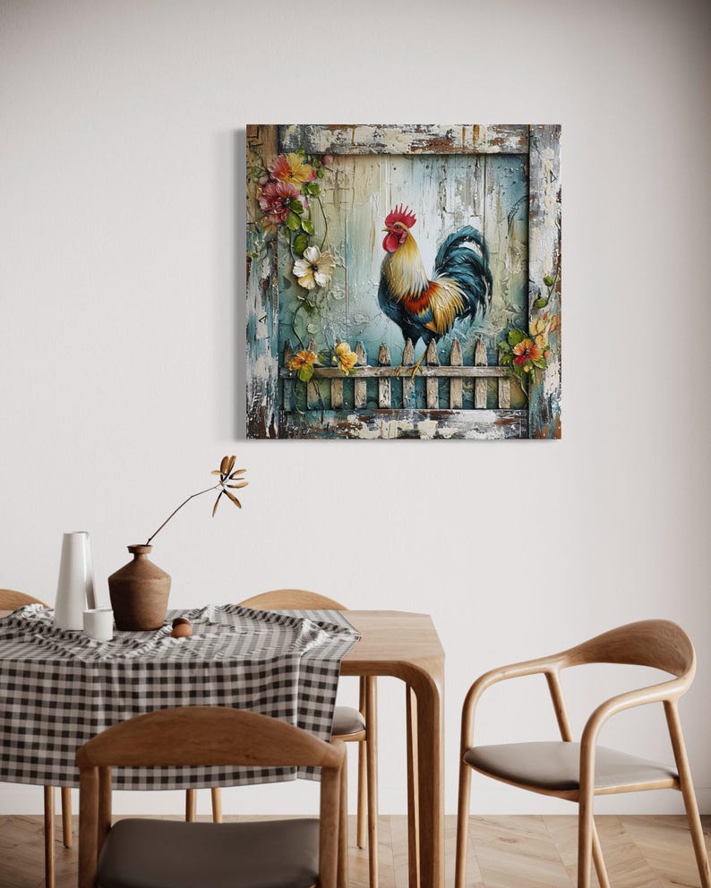 a dining room with a wooden table and chairs, a vase with flowers, and a framed painting of a rooster on the wall.