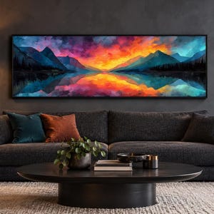 May include: A panoramic rectangular wall art piece featuring a vibrant landscape painting of mountains and a lake at sunset. The sky displays bold gradients of orange, red, purple, and blue, with the scenery reflected in the calm water below.