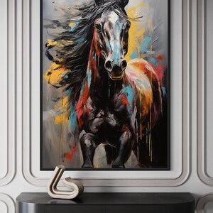 a large, colorful painting of a horse with flowing mane and tail, displayed on a wall above a black shelf.