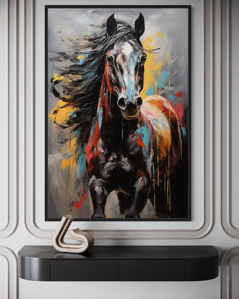 a large, colorful painting of a horse with flowing mane and tail, displayed on a wall above a black shelf.