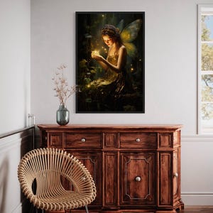 a fairy with wings, sitting in a room with a wooden cabinet and a woven chair.