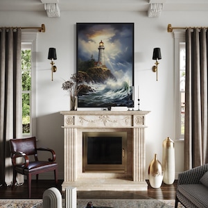 a cozy living room with a fireplace, a large painting of a lighthouse, and a comfortable seating area with a couch and a chair.