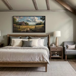a serene bedroom with a large bed, wooden furniture, and a painting of a rural landscape on the wall.