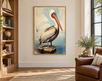 Könnte beinhalten: Ein gerahmter vertikaler Wandkunstdruck mit einer detaillierten Illustration eines Pelikans, der auf einem Holzpfahl im Wasser steht. Der Vogel hat weißes und graues Gefieder mit einem markanten roten und gelben Schnabel vor einem hellblauen Himmel.