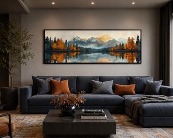 Peut inclure: Une peinture de paysage panoramique dans un cadre noir représentant une chaîne de montagnes, un lac calme et des arbres d'automne au feuillage orange et vert foncé. L'œuvre affiche un reflet des montagnes et des arbres sur l'eau.