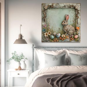 a cozy bedroom scene with a bed, a nightstand, and a painting of a rabbit sitting in a field of flowers.