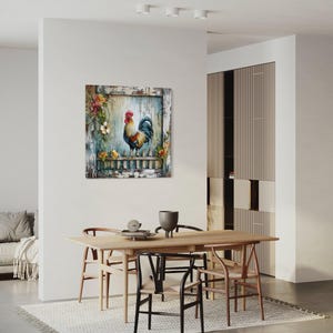 a dining room with a wooden table and chairs, a painting of a rooster on the wall, and a couch in the background.