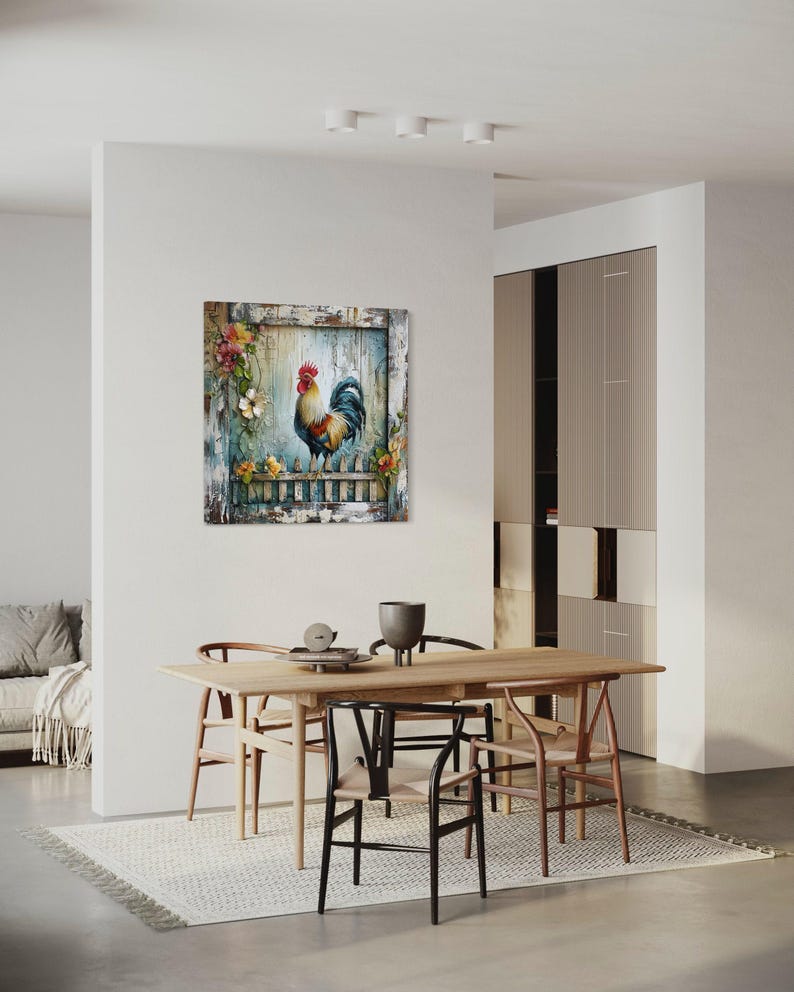 a dining room with a wooden table and chairs, a painting of a rooster on the wall, and a couch in the background.