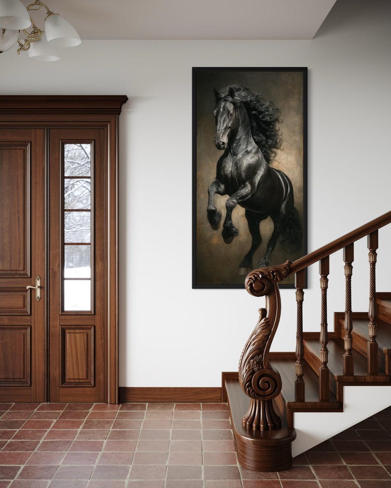 a large black horse in mid-gallop, captured in a striking black and white photograph, which is prominently displayed on the wall above a wooden staircase.