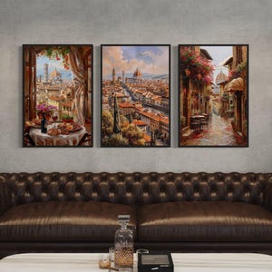 a cozy living room with a brown leather sofa and a coffee table in front of it. Above the sofa, there are three framed paintings depicting different scenes, including a cityscape, a street scene, and a garden. The paintings are hung on the wall, creating a visually appealing and harmonious space.