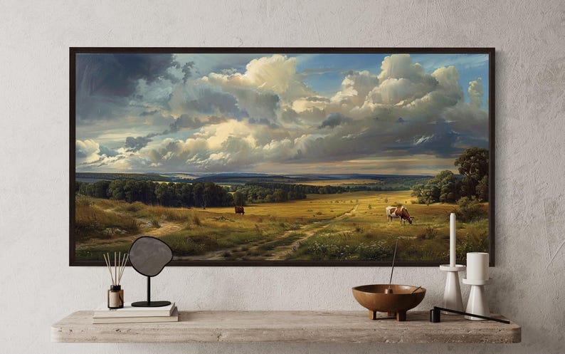a large painting of a countryside landscape with a cow grazing in the foreground. The painting is hung on a wall above a wooden shelf, which has various items on it, including a mirror, a candle holder, and a bowl.